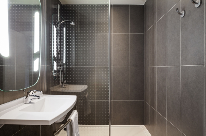 Imagen de la habitación del Hotel Ibis Paris Gare du Nord Chateau Landon 10ème. Foto 11
