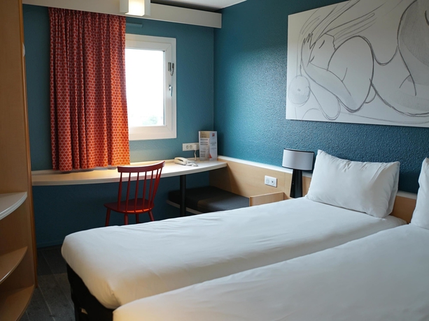 Imagen de la habitación del Hotel Ibis Paris Nord Villepinte Parc Des Expositions. Foto 8