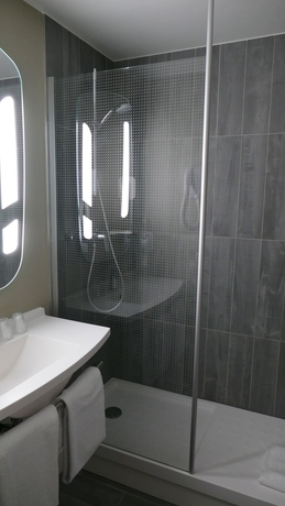 Imagen de la habitación del Hotel Ibis Paris Nord Villepinte Parc Des Expositions. Foto 17