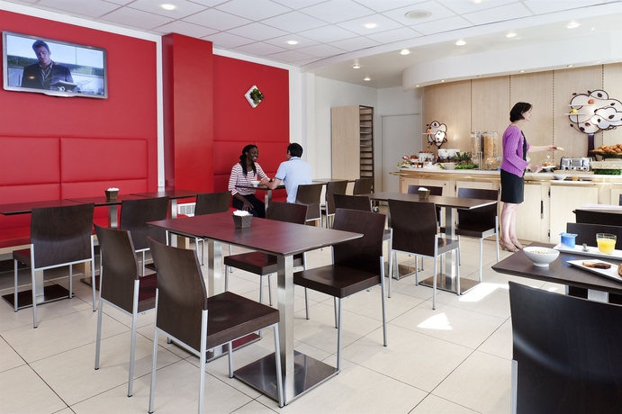 Imagen del bar/restaurante del Hotel Ibis Paris Ornano Montmartre Nord 18ème. Foto 6