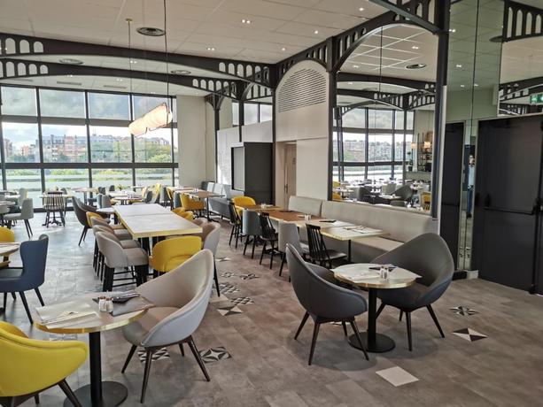 Imagen del bar/restaurante del Hotel Ibis Paris Porte de Montreuil. Foto 2