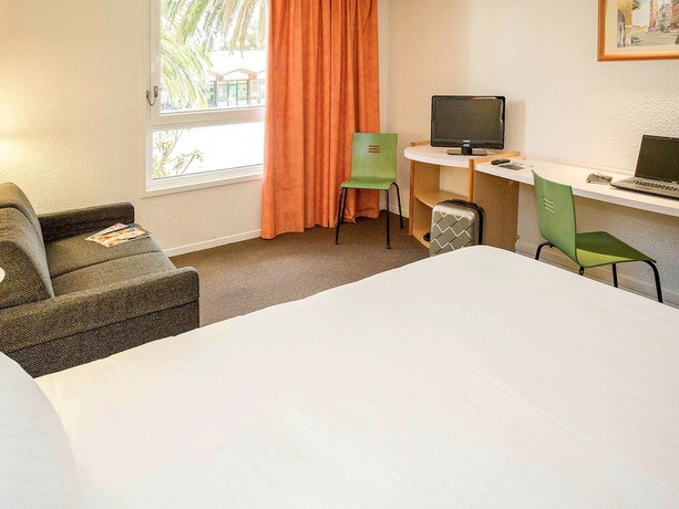 Imagen de la habitación del Hotel Ibis Perpignan Nord Rivesaltes. Foto 7