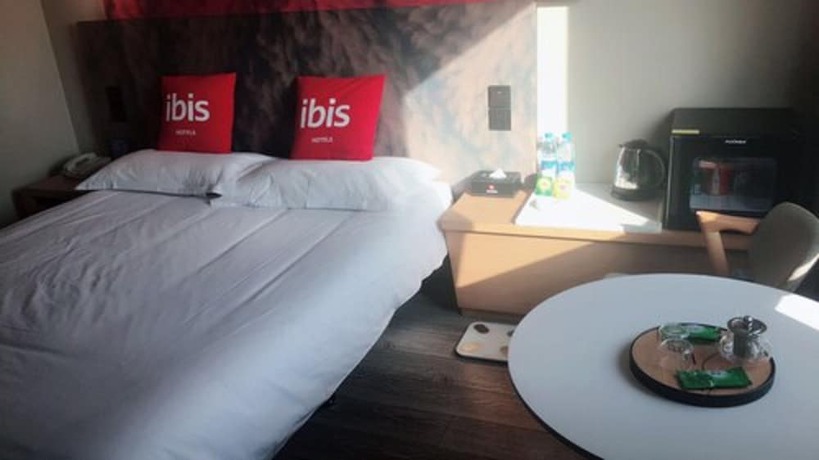 Imagen de la habitación del Hotel Ibis Qingdao Ningxia. Foto 15