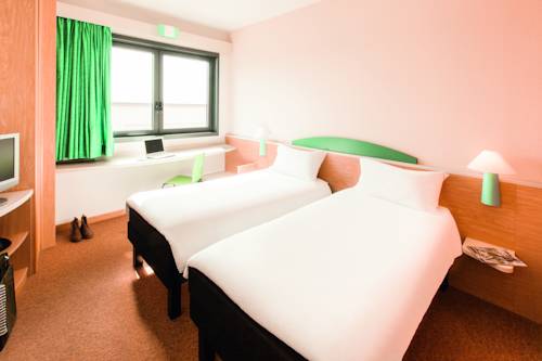 Imagen de la habitación del Hotel Ibis Roma Fiera. Foto 3