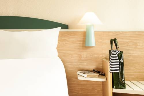 Imagen de la habitación del Hotel Ibis Roma Fiera. Foto 5