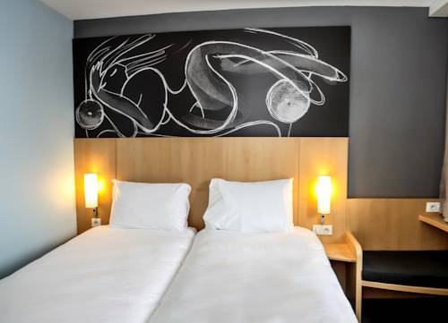 Imagen de la habitación del Hotel Ibis Saint Genis Pouilly Genève. Foto 6