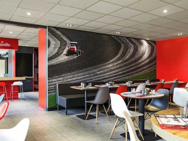 Imagen del bar/restaurante del Hotel Ibis Saint-denis Stade Ouest. Foto 5