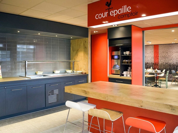 Imagen del bar/restaurante del Hotel Ibis Saint-denis Stade Ouest. Foto 7