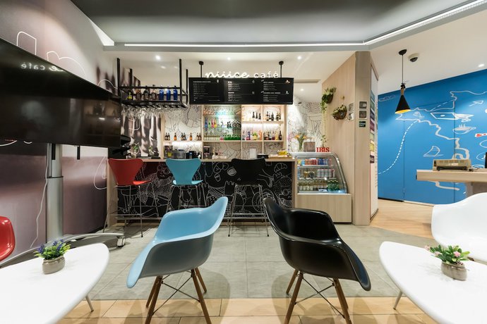 Imagen de la habitación del Hotel Ibis Shanghai Changshou. Foto 7