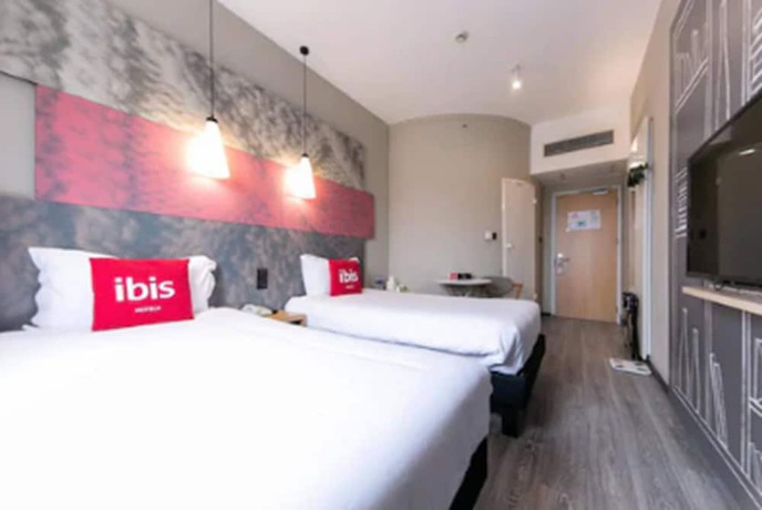 Imagen de la habitación del Hotel Ibis Shanghai Chengshan Road. Foto 5