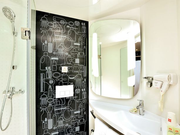 Imagen de la habitación del Hotel Ibis Shanghai Chengshan Road. Foto 11