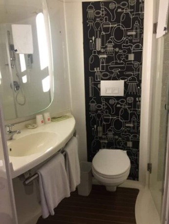 Imagen de la habitación del Hotel Ibis Shanghai Chengshan Road. Foto 12