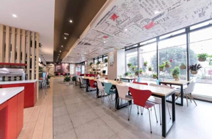 Imagen del bar/restaurante del Hotel Ibis Shanghai Chengshan Road. Foto 2