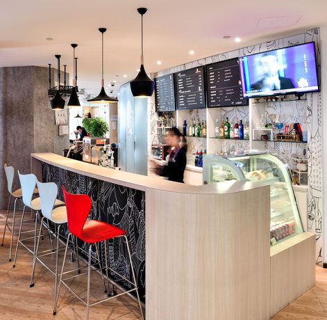 Imagen del bar/restaurante del Hotel Ibis Shanghai Chengshan Road. Foto 4
