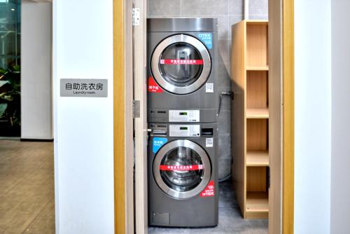 Imagen de la habitación del Hotel Ibis Shanghai Gubei. Foto 9