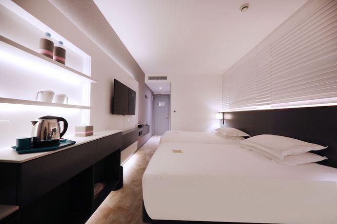 Imagen de la habitación del Hotel Ibis Shanghai Yu Garden. Foto 15