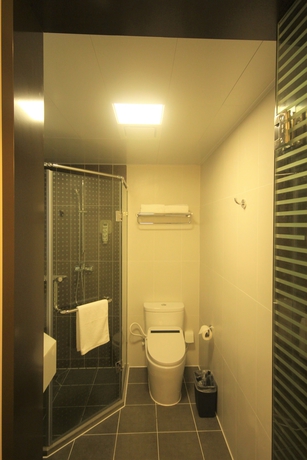 Imagen de la habitación del Hotel Ibis Shenyang North Station. Foto 14