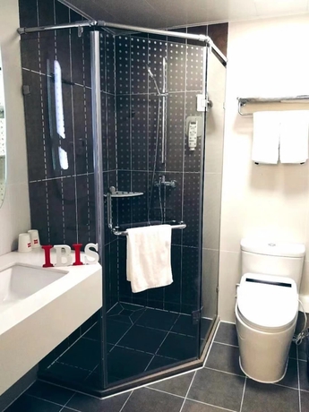 Imagen de la habitación del Hotel Ibis Shenyang North Station. Foto 15