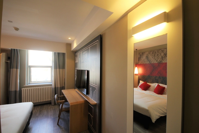 Imagen de la habitación del Hotel Ibis Shenyang North Station. Foto 19