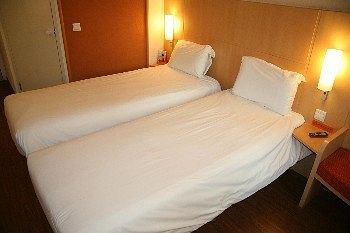 Imagen de la habitación del Hotel Ibis Shenyang Taiyuan Street. Foto 10