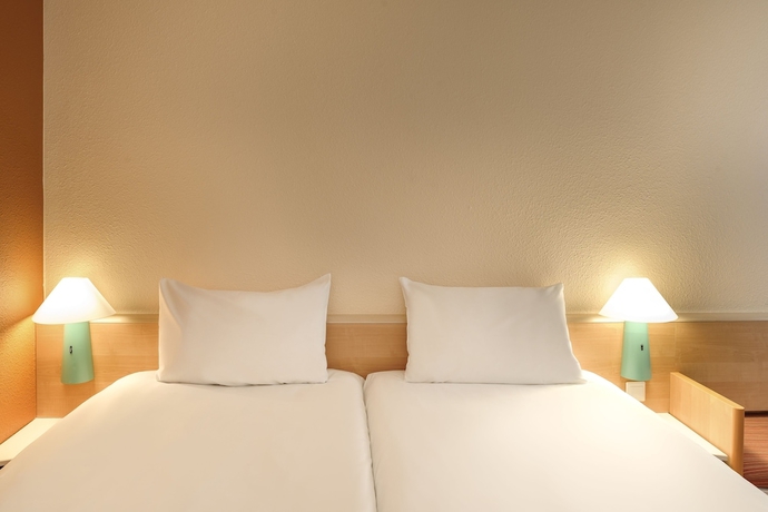 Imagen de la habitación del Hotel Ibis Sion. Foto 11