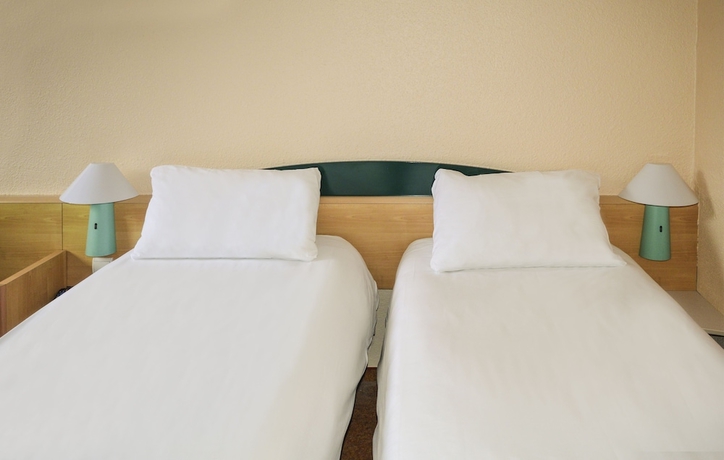 Imagen de la habitación del Hotel Ibis Sion. Foto 13