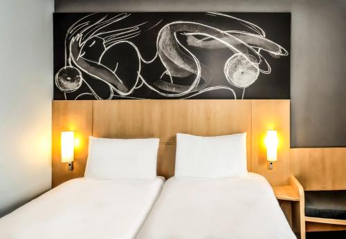 Imagen de la habitación del Hotel Ibis Strasbourg Centre Petite France. Foto 4