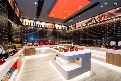 Imagen general del Hotel Ibis Styles - 260M from Guangji Street Subway Station. Foto 5