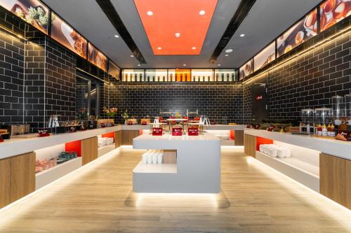 Imagen general del Hotel Ibis Styles - 260M from Guangji Street Subway Station. Foto 8