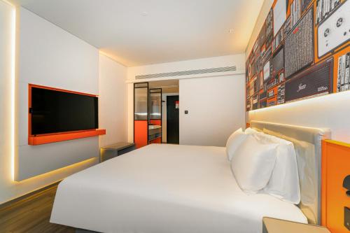 Imagen de la habitación del Hotel Ibis Styles - 260M from Guangji Street Subway Station. Foto 16