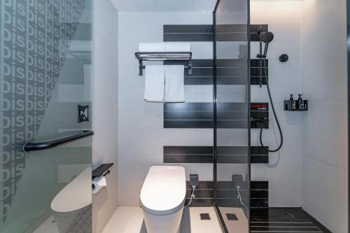 Imagen de la habitación del Hotel Ibis Styles - 260M from Guangji Street Subway Station. Foto 17