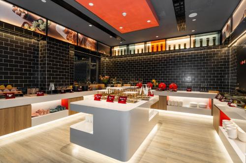 Imagen general del Hotel Ibis Styles - 260M from Guangji Street Subway Station. Foto 13