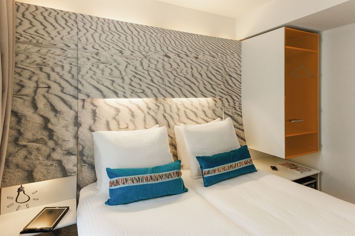 Imagen de la habitación del Hotel Ibis Styles Amsterdam Central Station. Foto 10