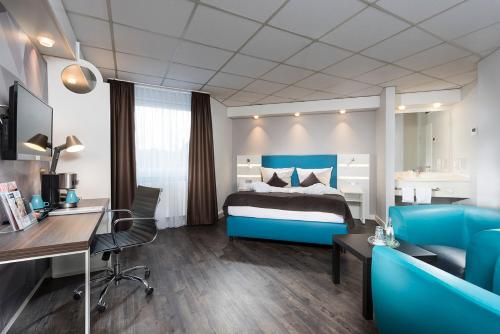 Imagen de la habitación del Hotel Ibis Styles Cologne Airport. Foto 9