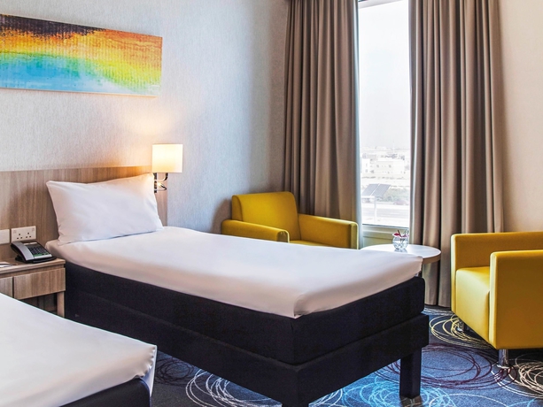 Imagen de la habitación del Hotel Ibis Styles Dragon Mart Dubai. Foto 10
