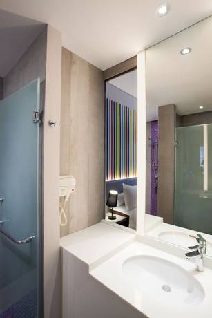 Imagen de la habitación del Hotel Ibis Styles Jakarta Mangga Dua Square. Foto 11