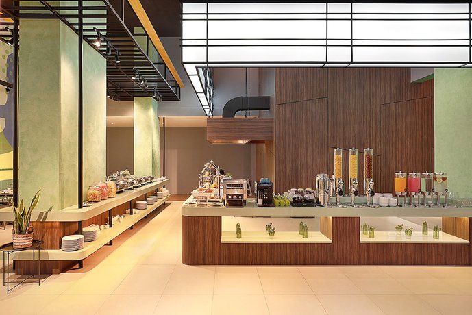 Imagen del bar/restaurante del Hotel Ibis Styles Jakarta Simatupang - Chse Certified. Foto 8