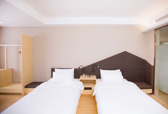 Imagen de la habitación del Hotel Ibis Styles Jingdezhen Cidu Avenue. Foto 11
