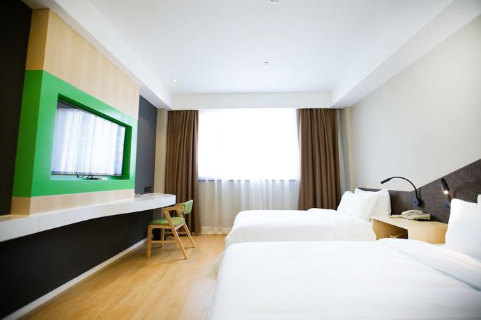 Imagen de la habitación del Hotel Ibis Styles Jingdezhen Cidu Avenue. Foto 14
