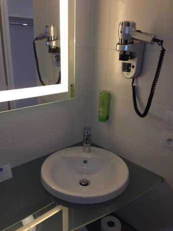 Imagen de la habitación del Hotel Ibis Styles Lyon Gorge de Loup Saphir. Foto 5