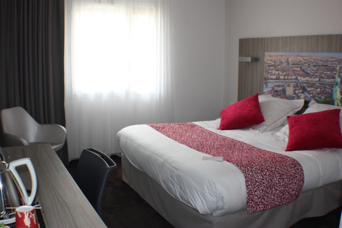 Imagen de la habitación del Hotel Ibis Styles Lyon Gorge de Loup Saphir. Foto 6