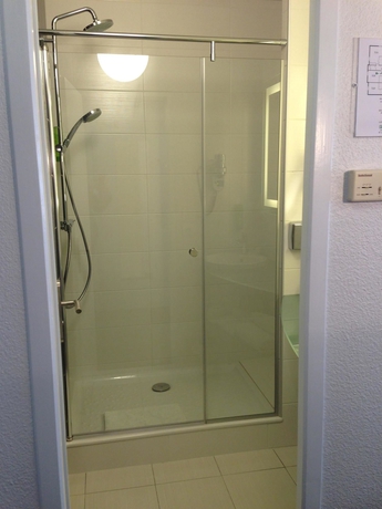 Imagen de la habitación del Hotel Ibis Styles Lyon Gorge de Loup Saphir. Foto 7