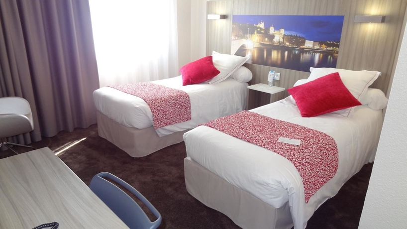 Imagen de la habitación del Hotel Ibis Styles Lyon Gorge de Loup Saphir. Foto 11