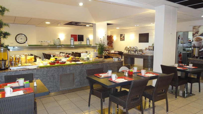 Imagen del bar/restaurante del Hotel Ibis Styles Lyon Gorge de Loup Saphir. Foto 4
