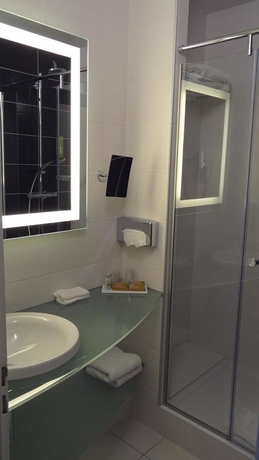 Imagen de la habitación del Hotel Ibis Styles Lyon Gorge de Loup Saphir. Foto 12