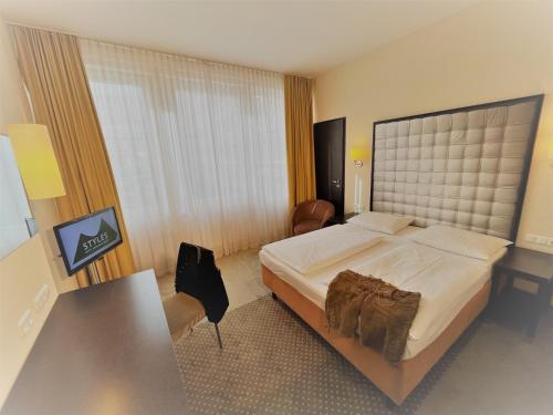 Imagen de la habitación del Hotel Ibis Styles M&uuml;nchen Ost Messe. Foto 14