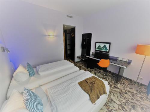 Imagen de la habitación del Hotel Ibis Styles M&uuml;nchen Ost Messe. Foto 16