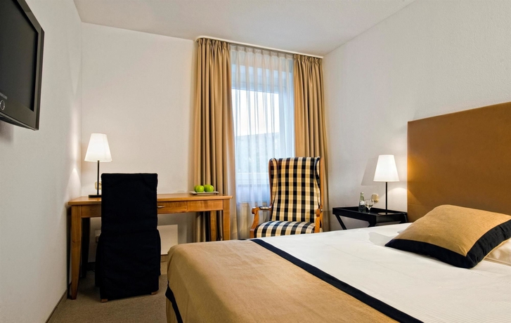 Imagen de la habitación del Hotel Ibis Styles Rosenheim. Foto 8