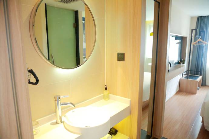 Imagen de la habitación del Hotel Ibis Styles Shanghai Qingpu Sports Center Hotel. Foto 14