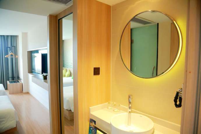 Imagen de la habitación del Hotel Ibis Styles Shanghai Qingpu Sports Center Hotel. Foto 16
